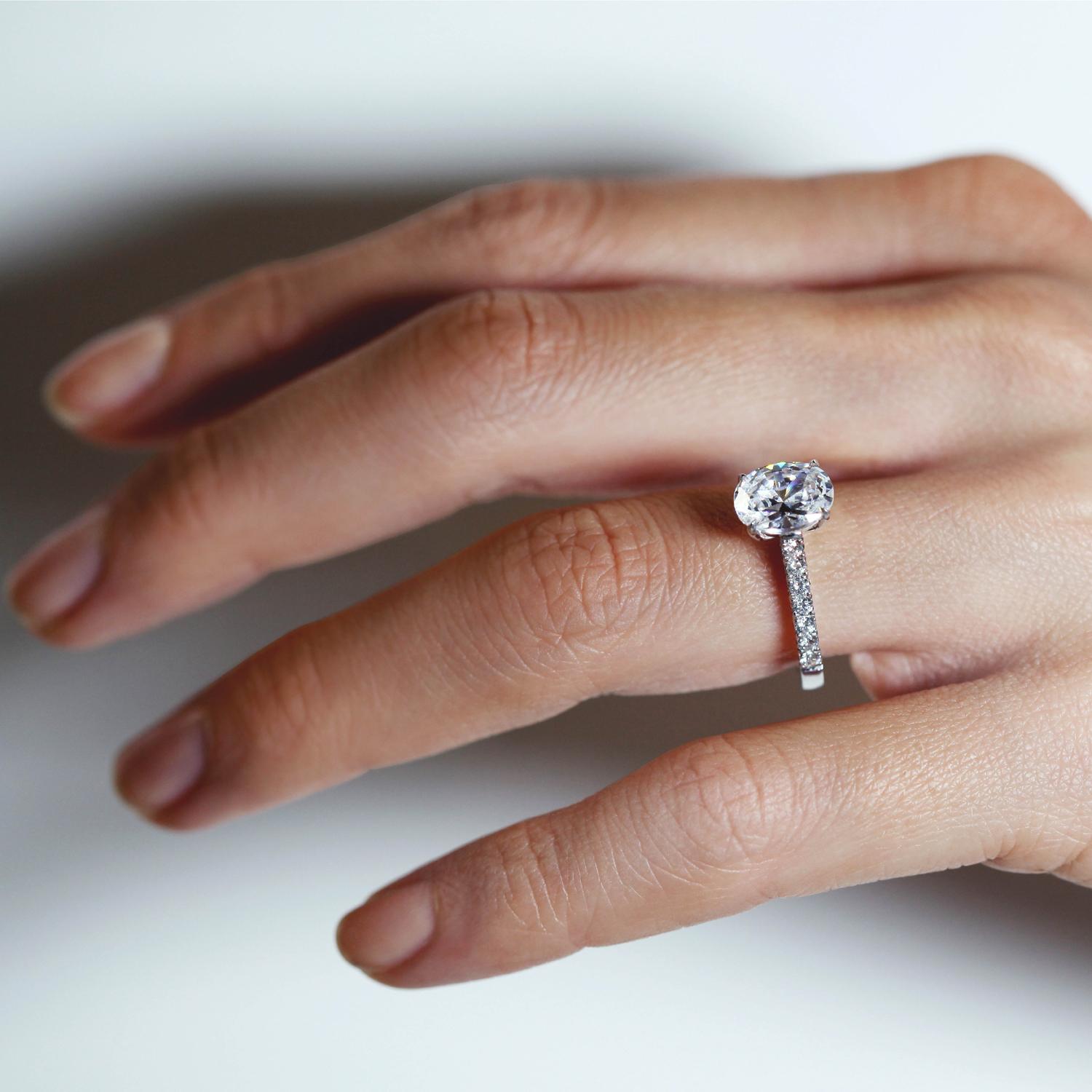 EVERLASTING OVAL CUT DIAMOND ENGAGEMEN TRING with diamond band