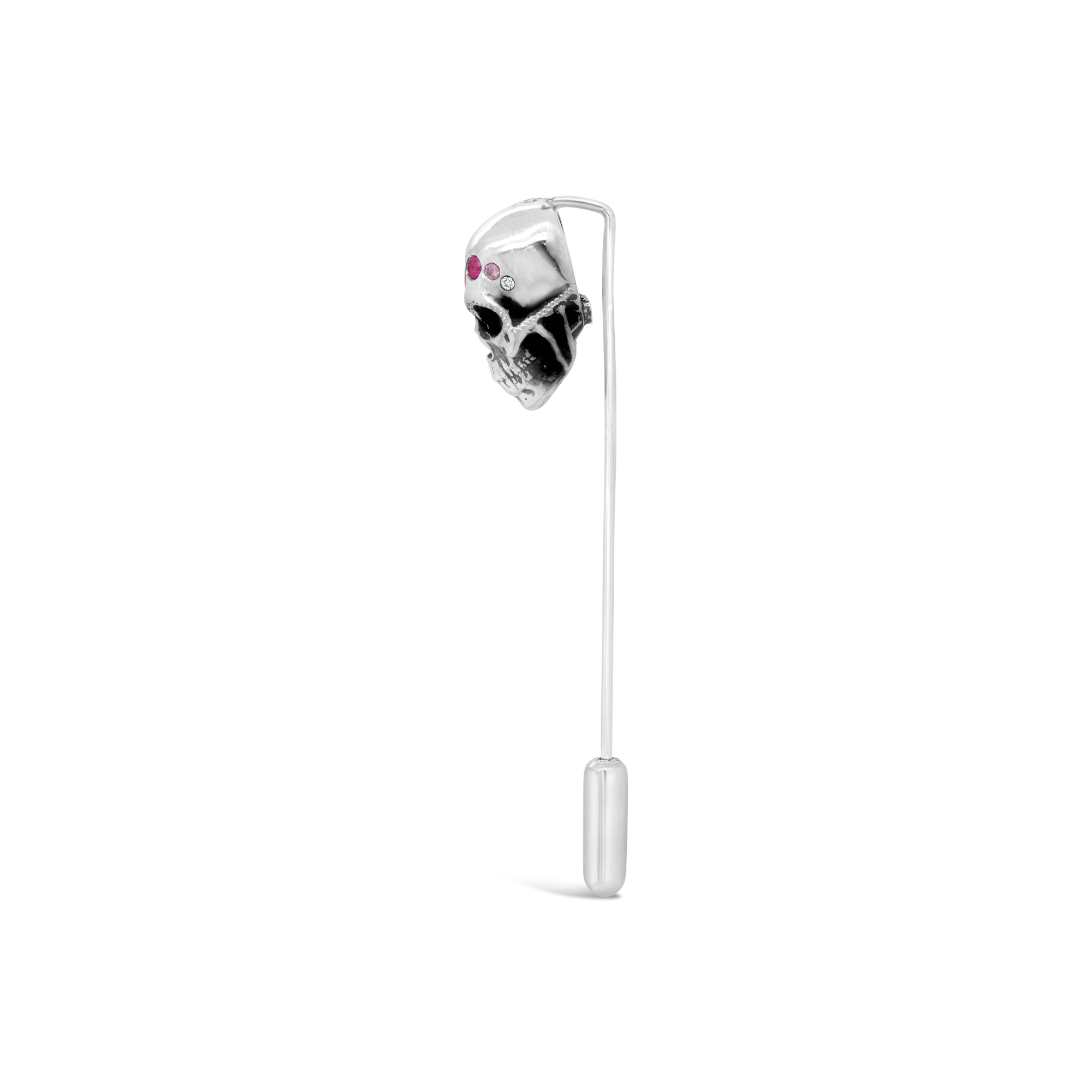 Skull and gemstone suit jacket lapel pin
