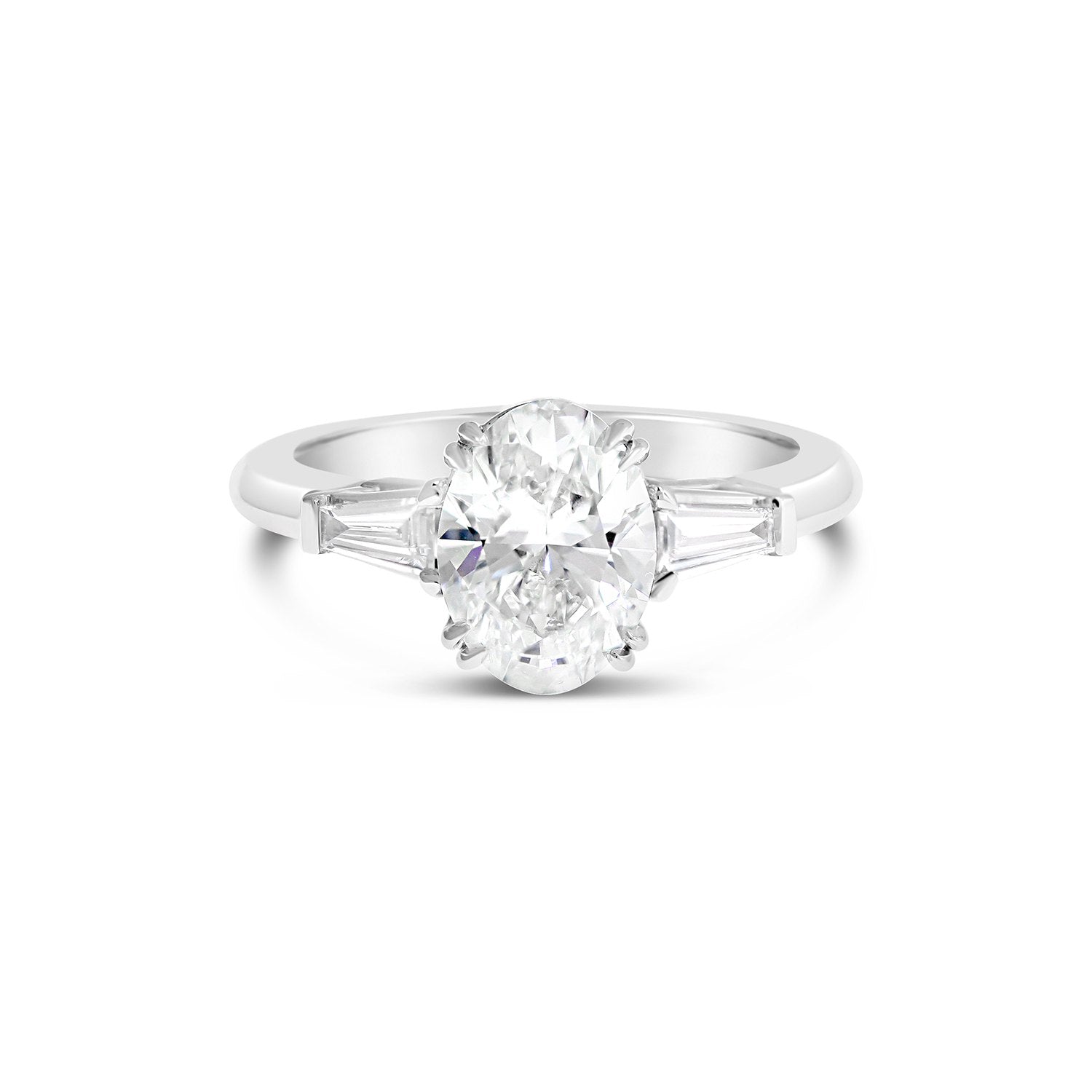 Oval Cut & Tapered Baguette Cut Diamond Three Stone Engagement Ring with plain band 