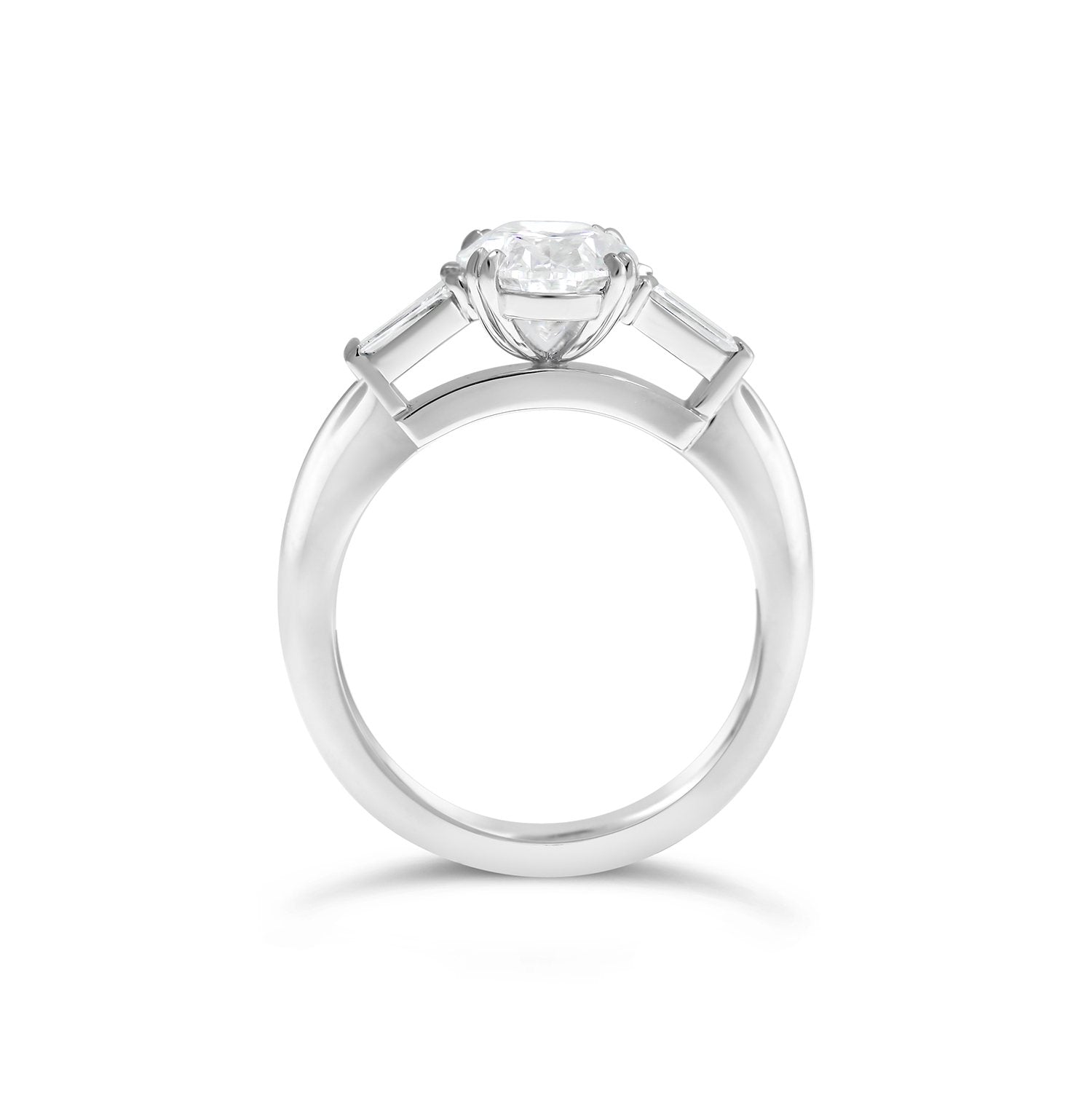 Oval Cut & Tapered Baguette Cut Diamond Three Stone Engagement Ring with plain band 