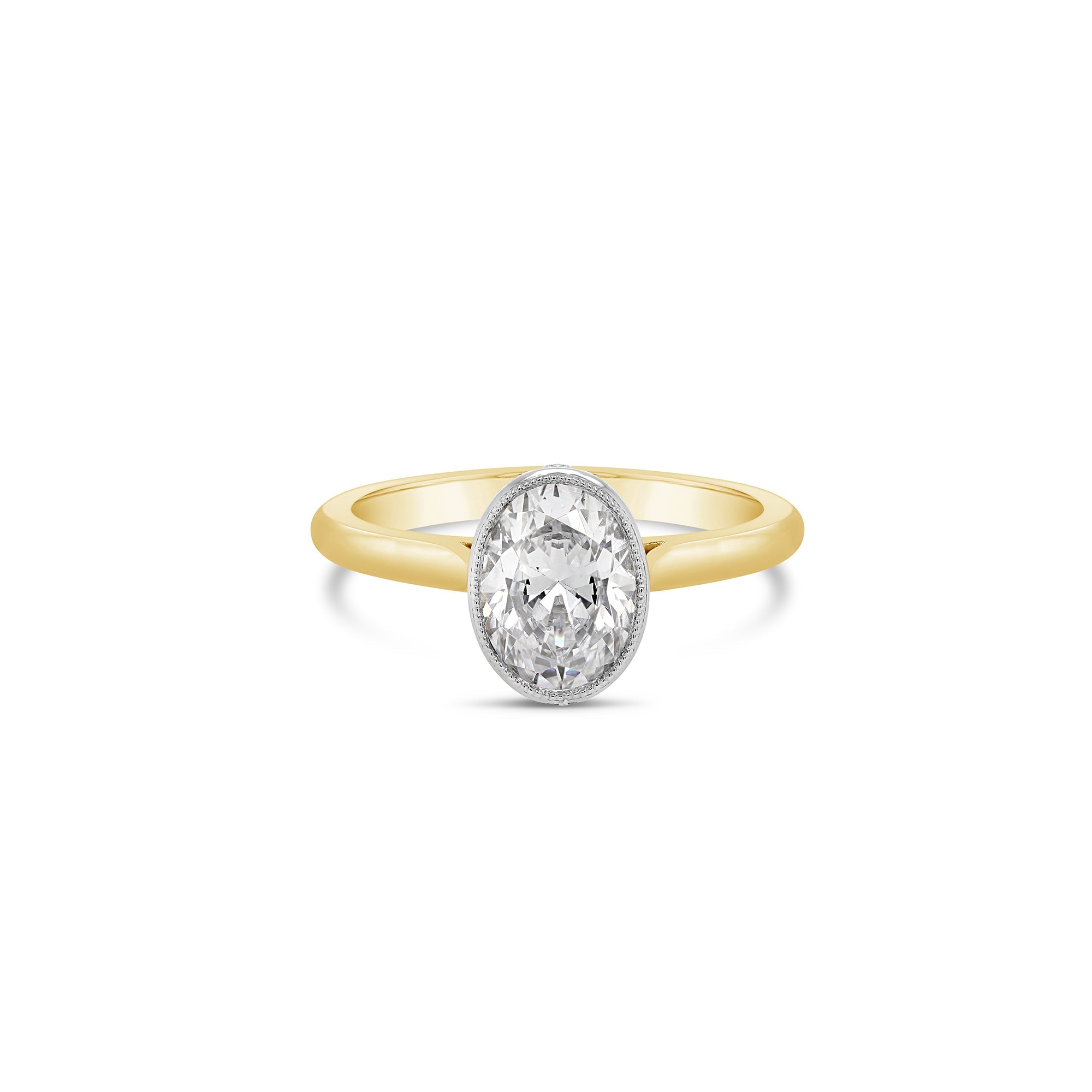 Oval Cut Bezel set Diamond Engagement Ring yellow gold