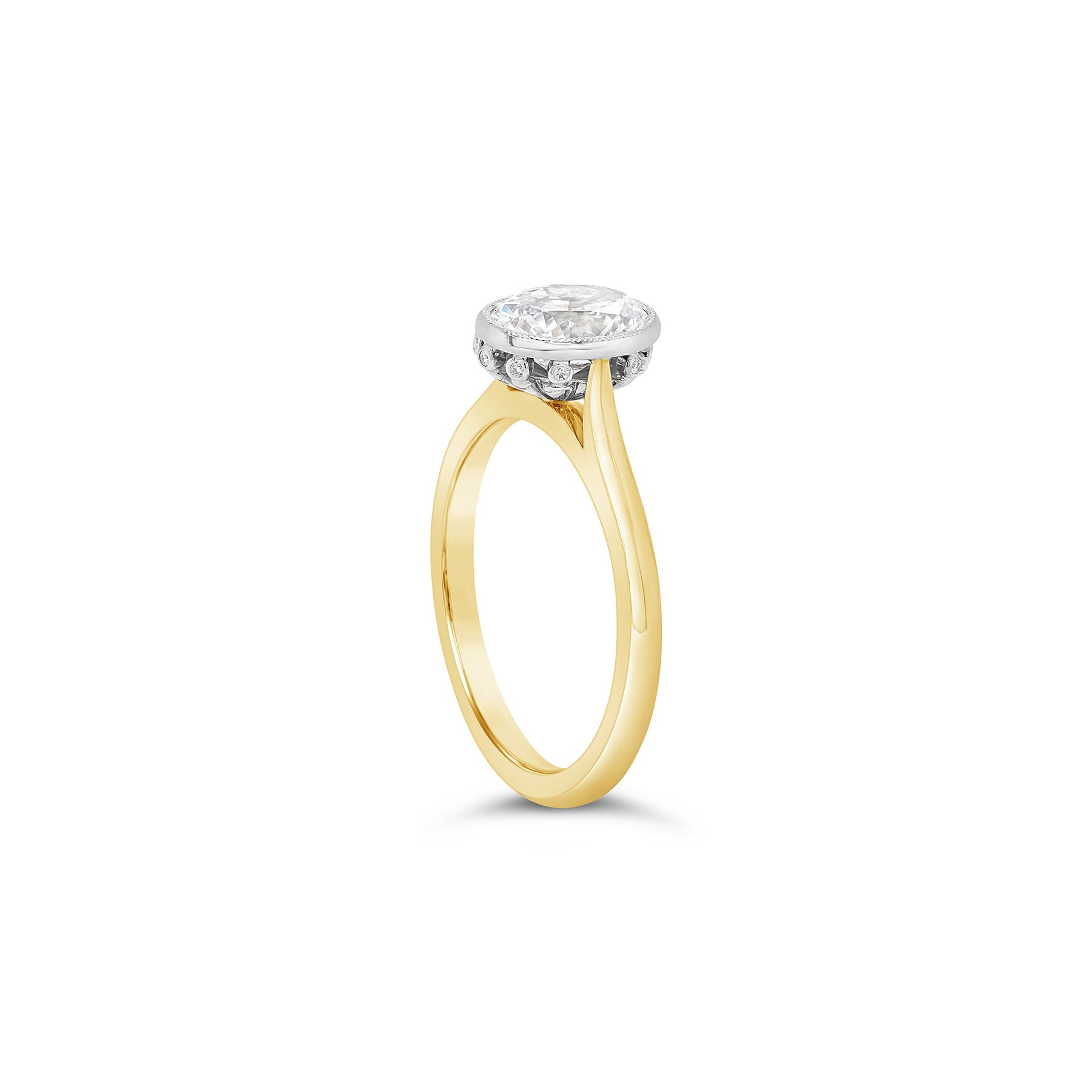 Oval Cut Bezel set Diamond Engagement Ring yellow gold