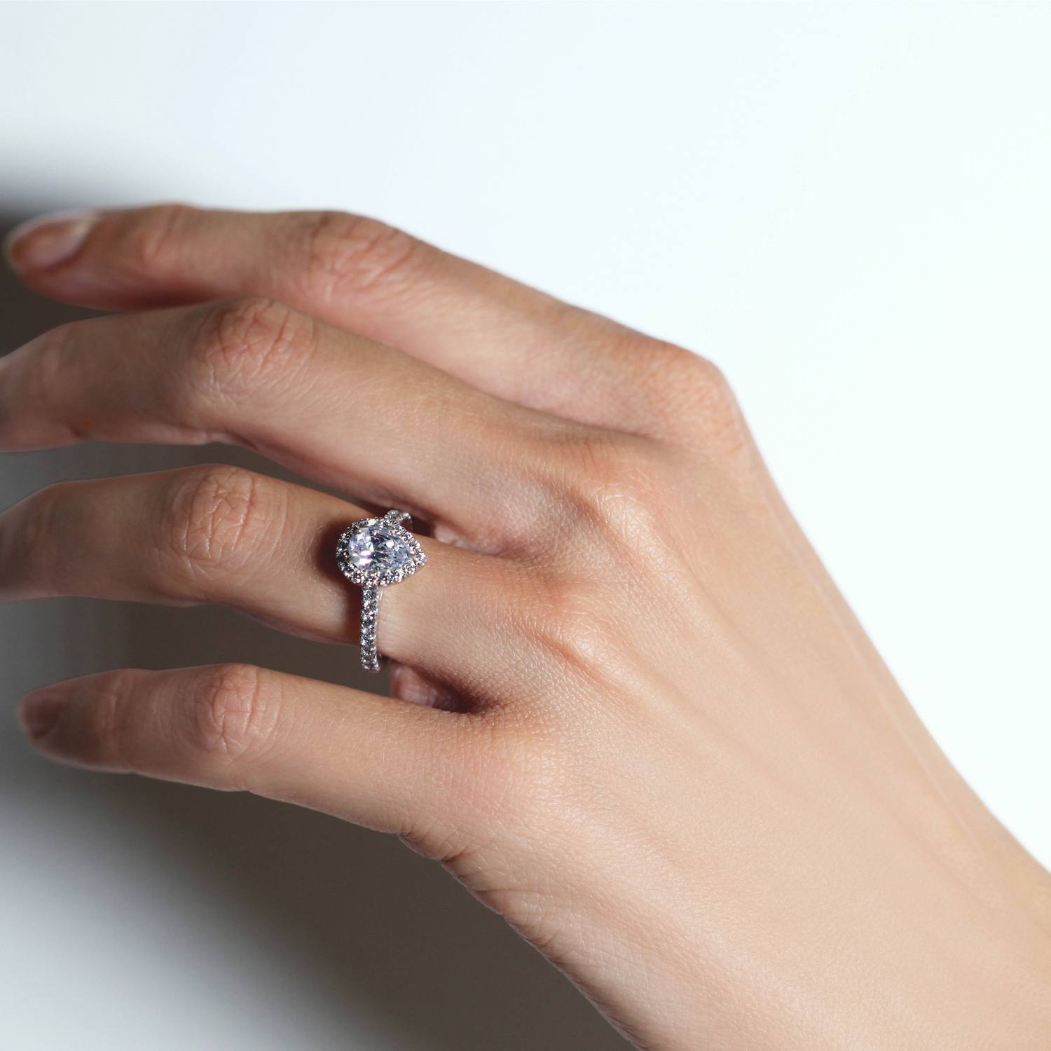 Pear Cut Solitaire Diamond Halo Engagement Ring