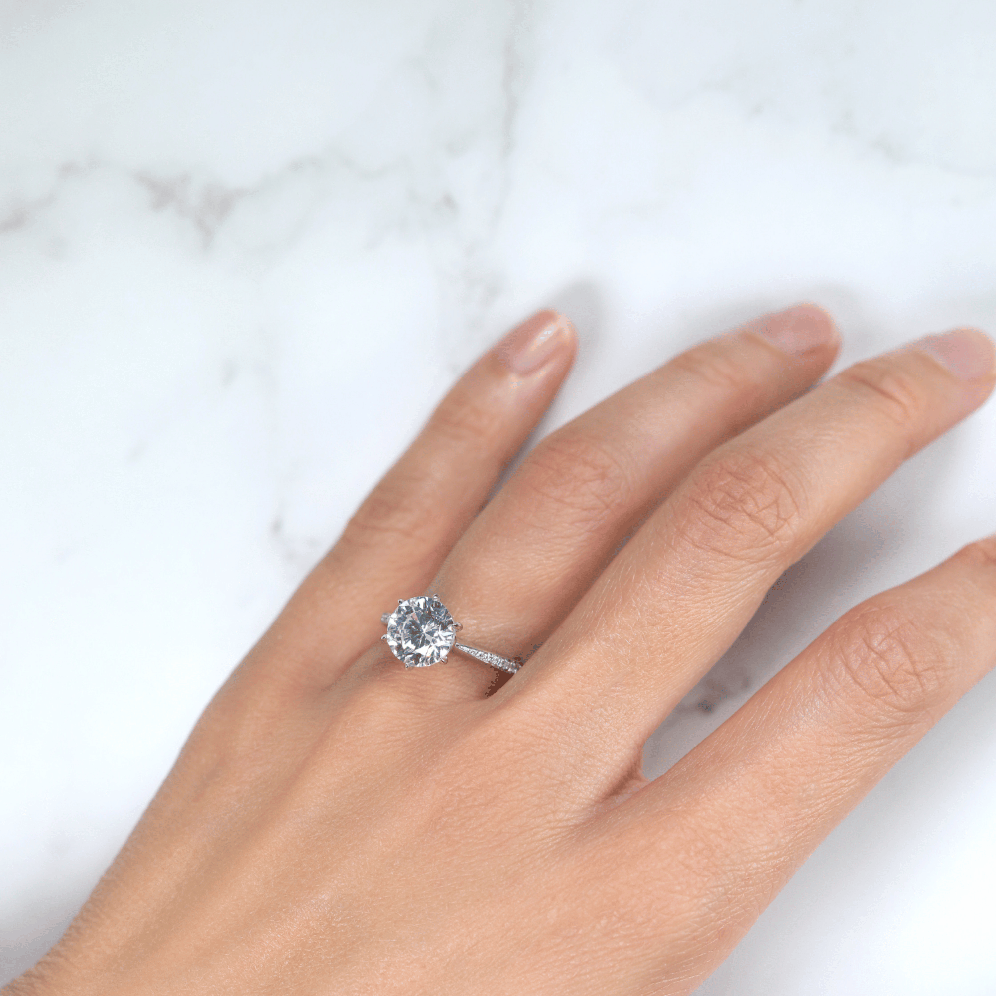 Round Brilliant Cut Diamond Engagement Ring tapered diamond band