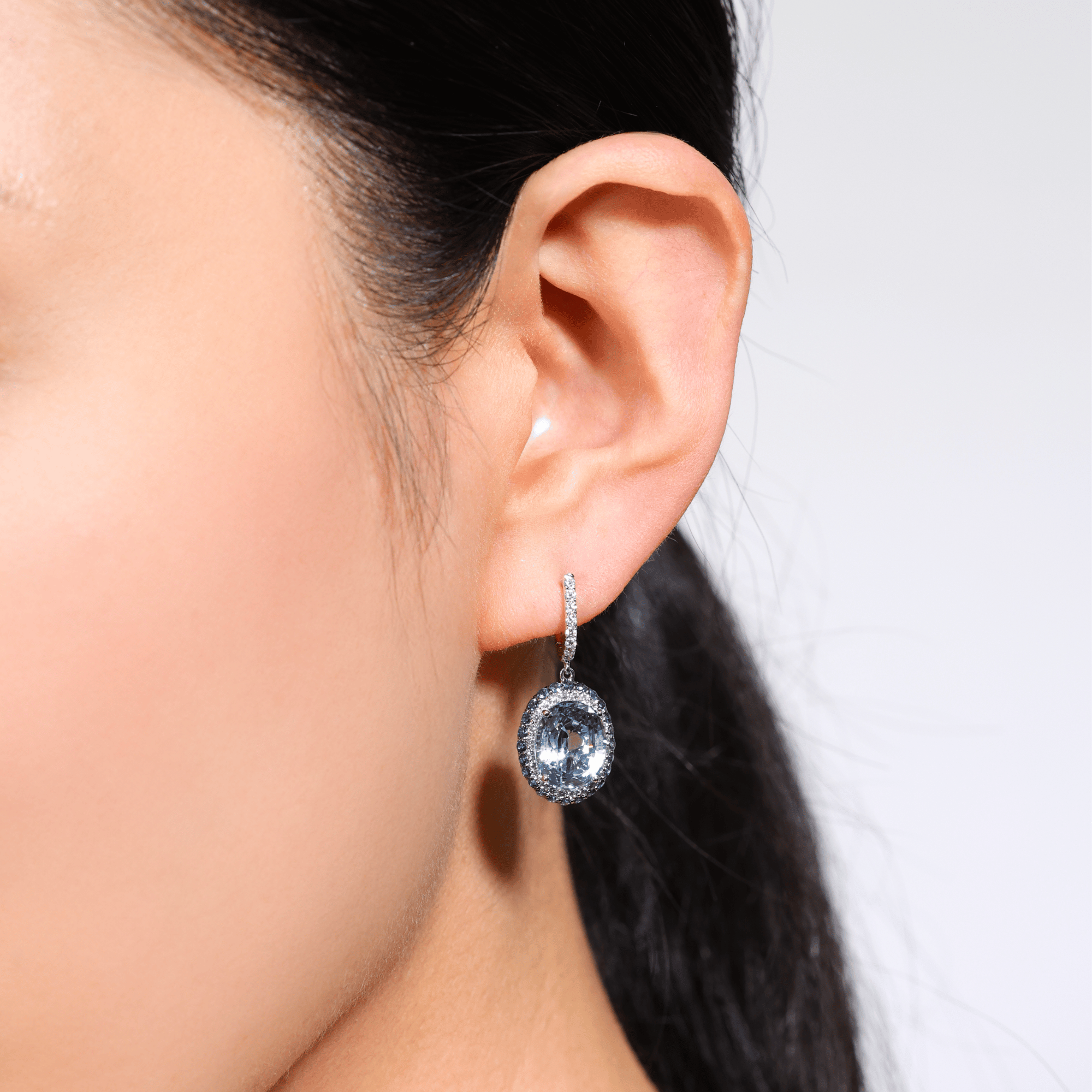 Blue topaz earrings with blue sapphire and diamond halo