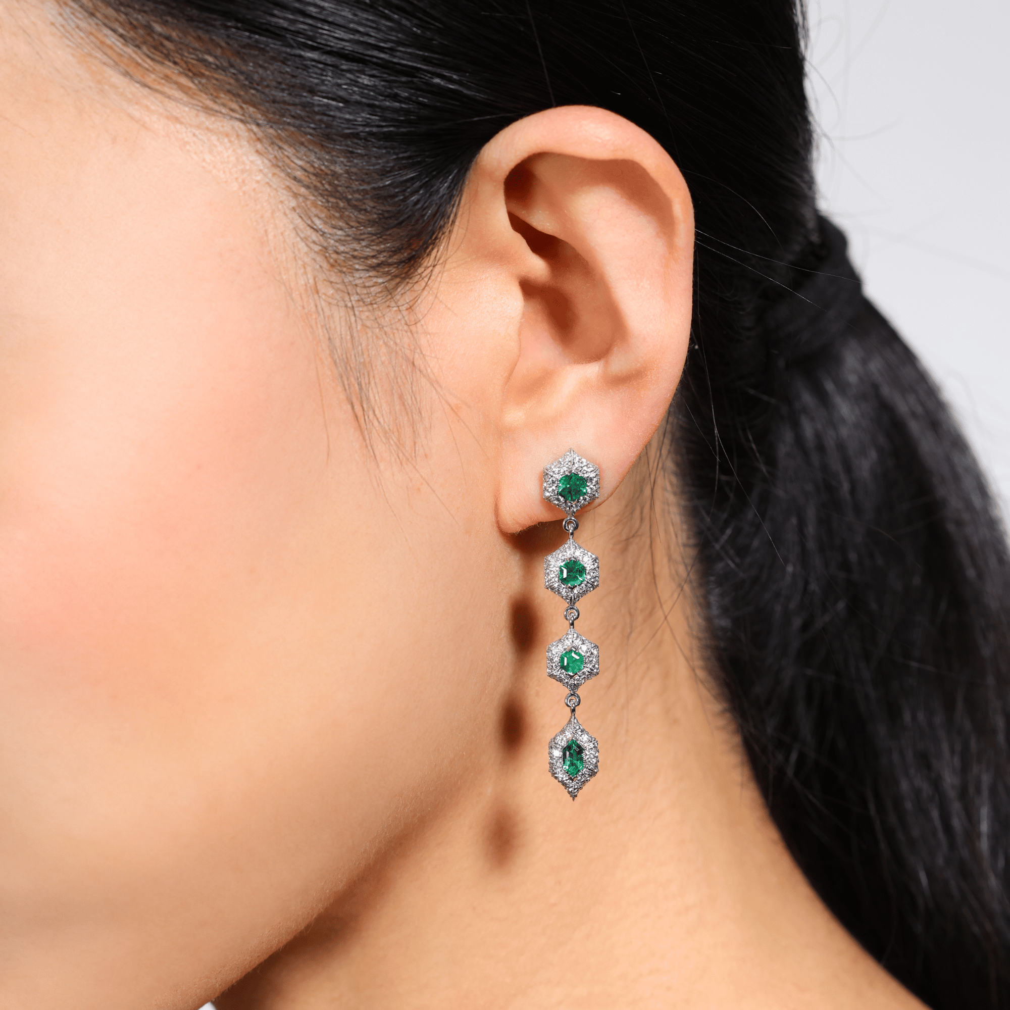 Emerald dangle earrings deals