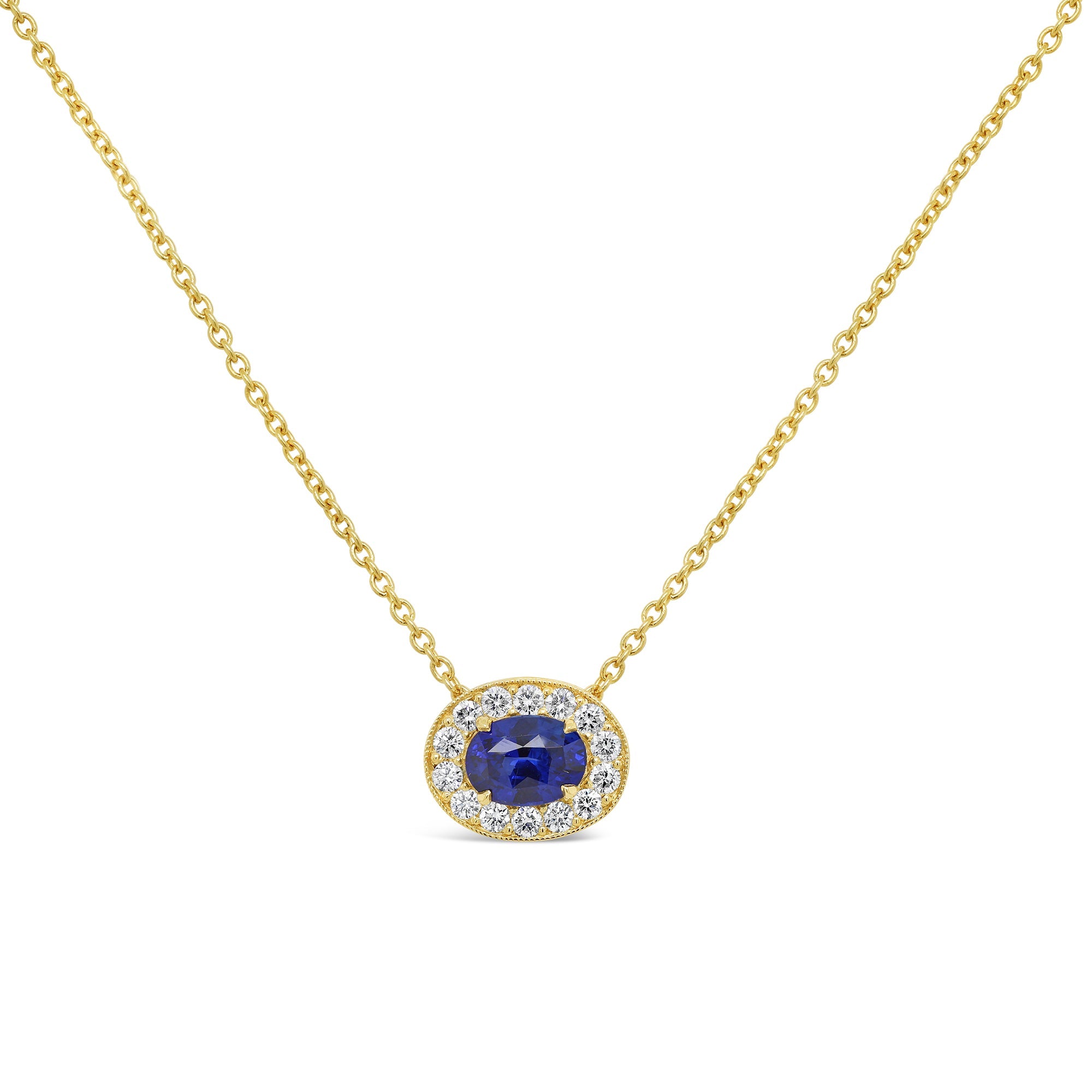 Blue sapphire, diamond and yellow gold pendant and necklace
