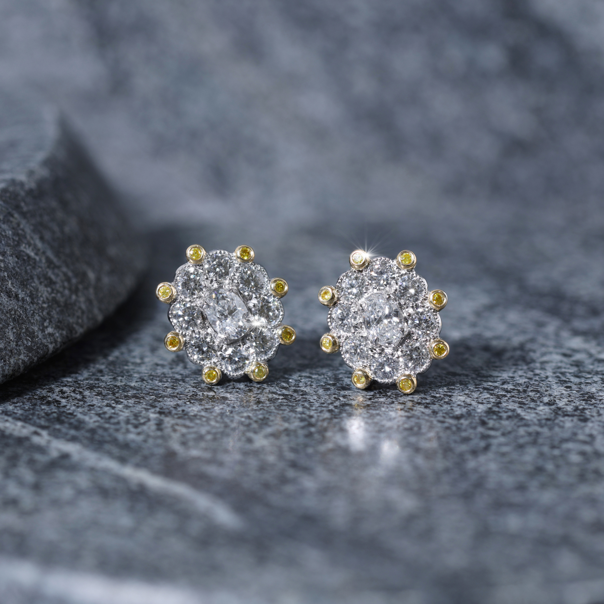 Diamond and yellow diamond stud earrings