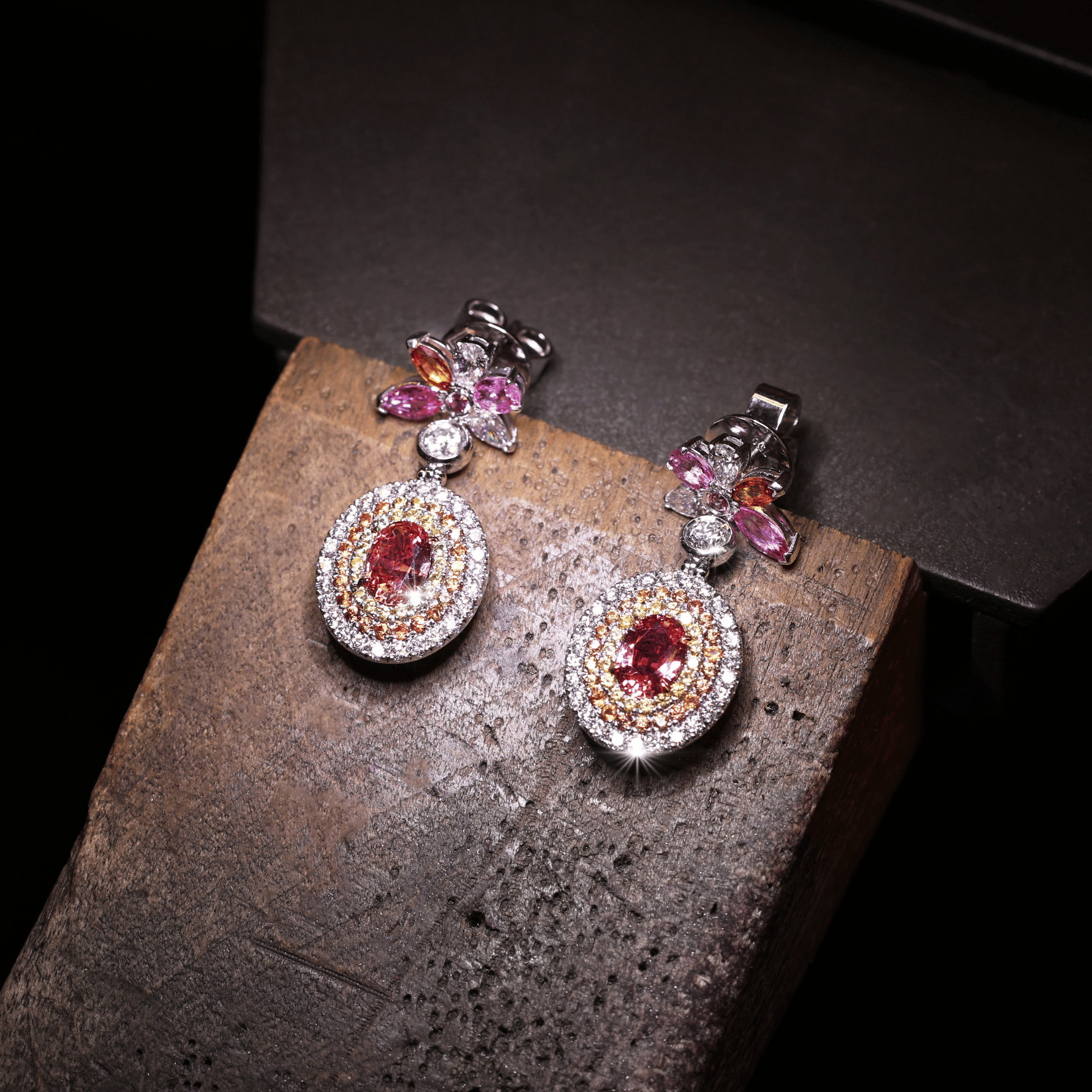 Padparadscha sapphire, pink, orange, and yellow sapphire and diamond earrings