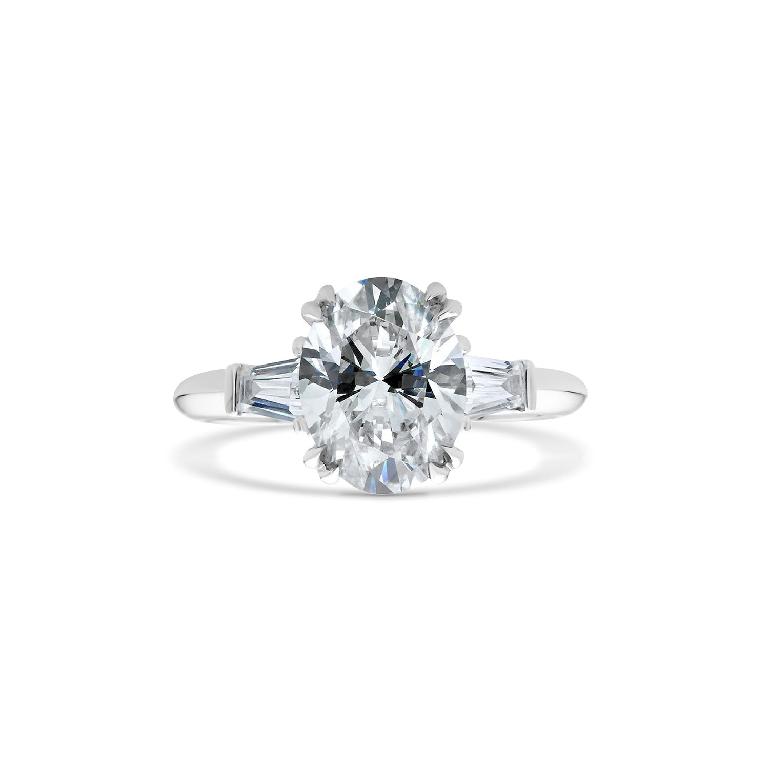 Oval Cut & Baguette Cut Diamond three stone Engagement Ring with plain band