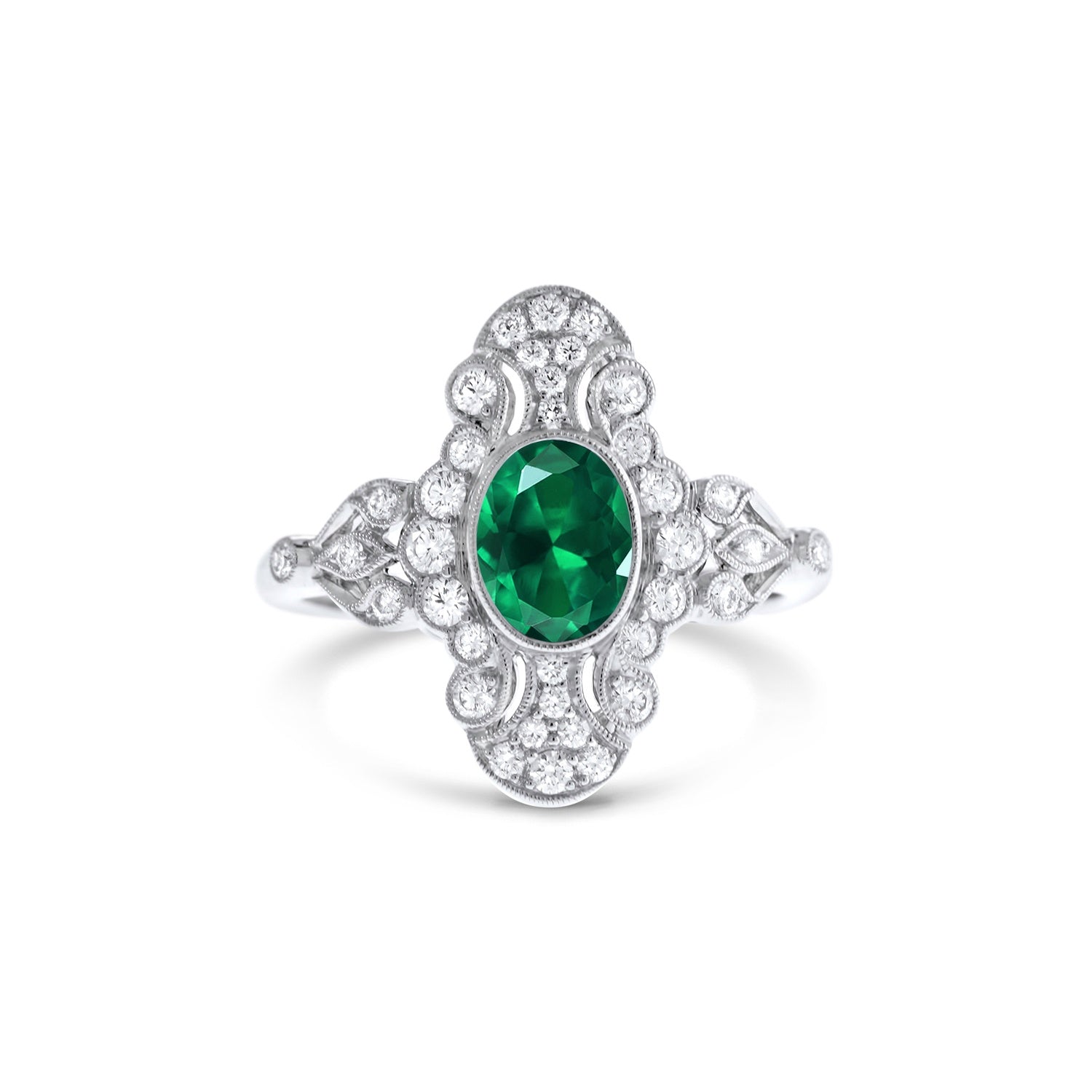 Art Deco inspired emerald and diamond dress ring