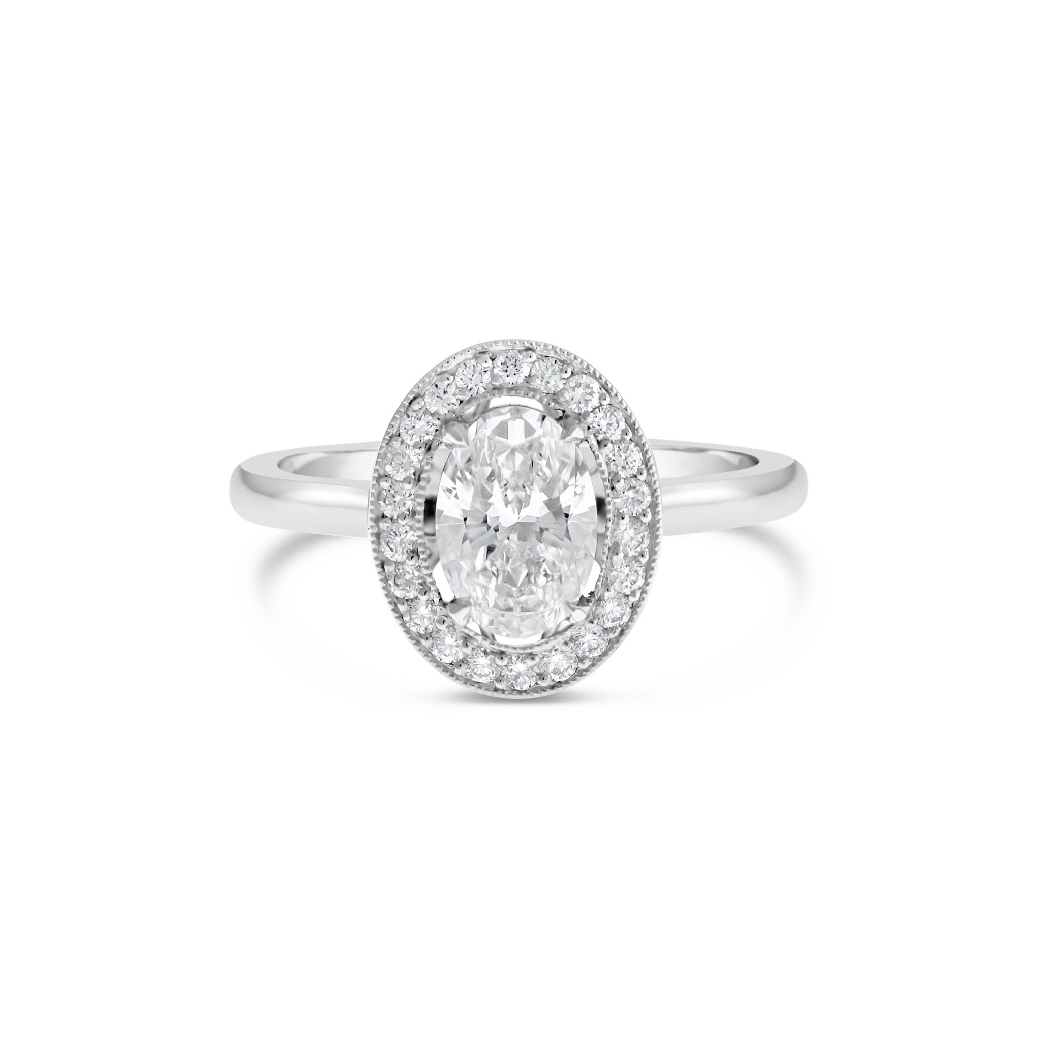SIGNATURE OVAL CUT DIAMOND HALO ENGAGEMENT RING WITH PLAIN BAND