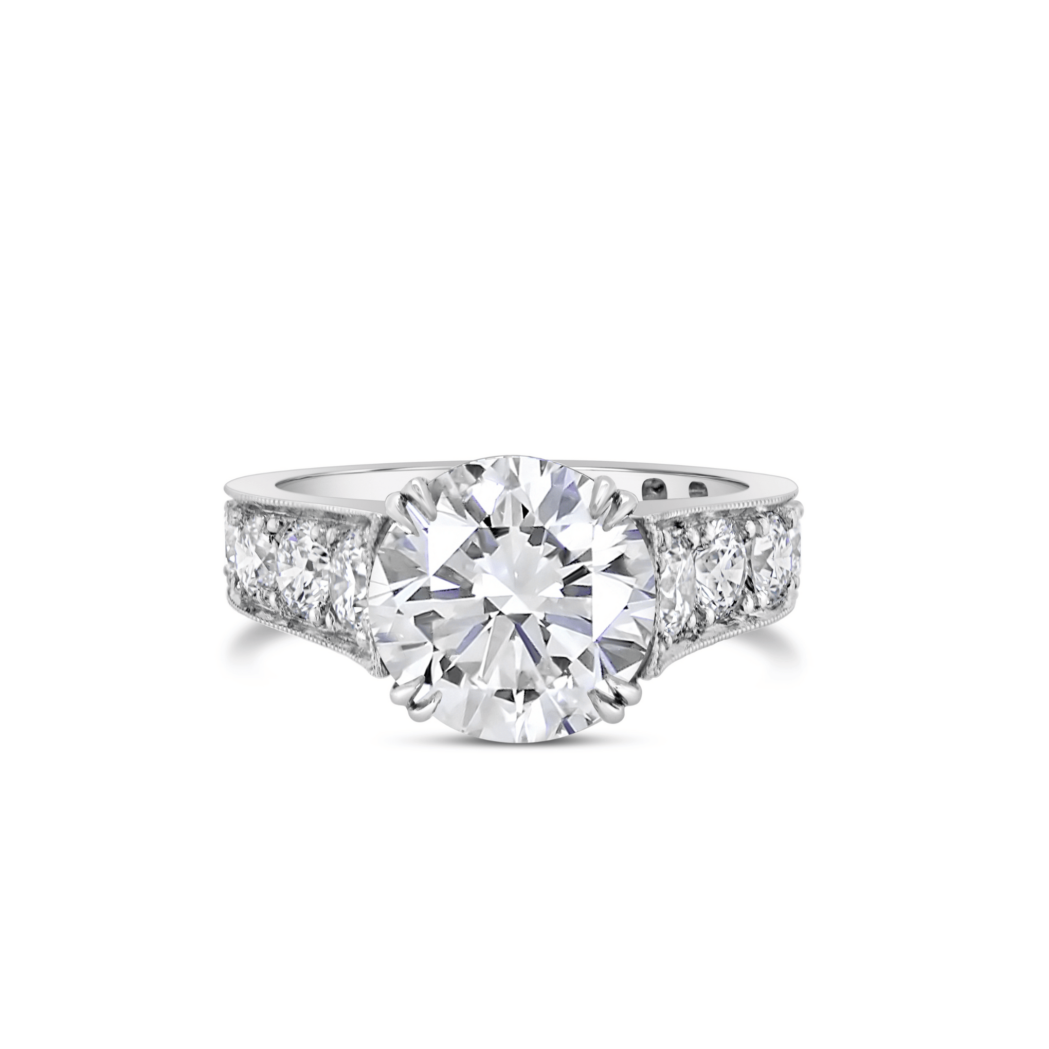 TIMELESS ROMANCE ROUND BRILLIANT CUT DIAMOND & TAPERED BAND ENGAGEMENT RING