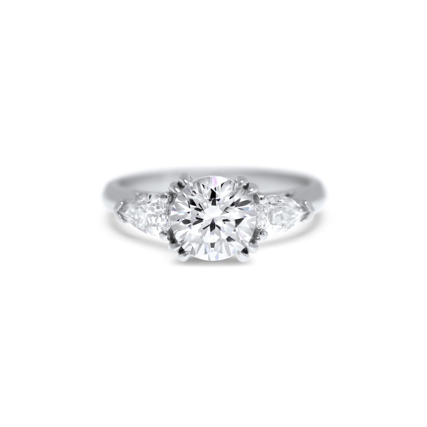 round brilliant diamond three stone engagement ring