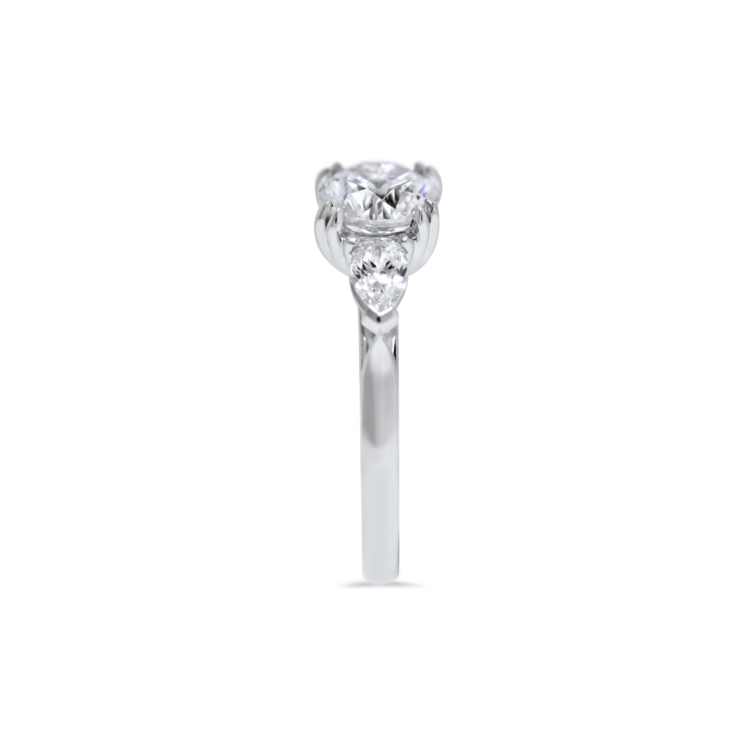 round brilliant diamond three stone engagement ring