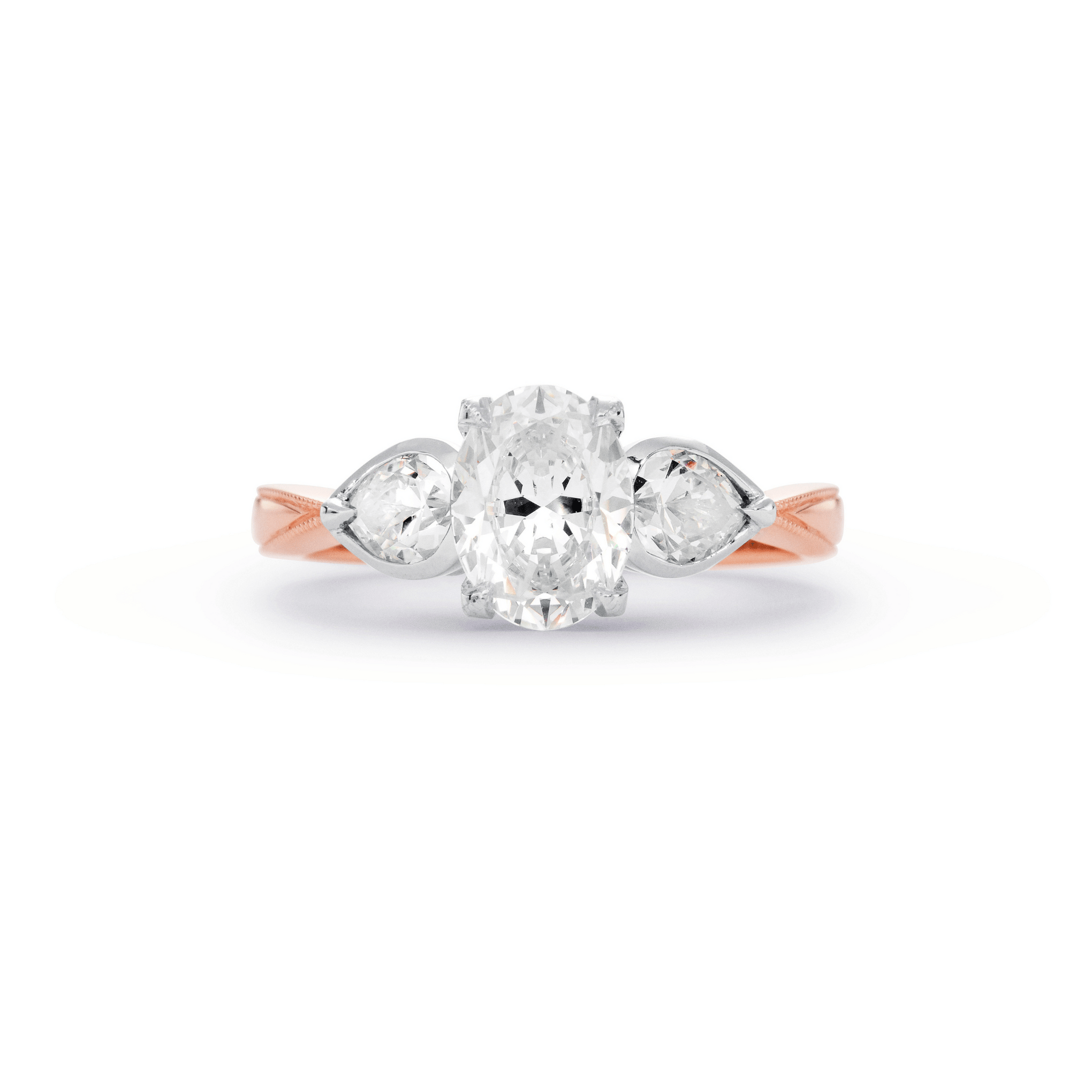 UNCONDITIONALLY YOURS CLAW-SET OVAL-CUT & PEAR-CUT DIAMOND ENGAGEMENT RING